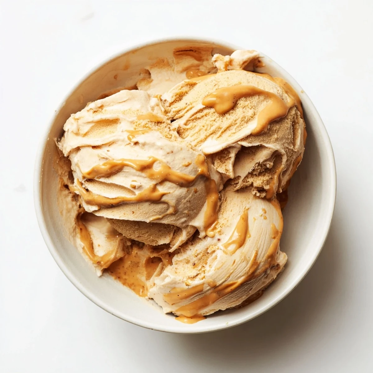 Creamy Peanut Butter Banana Ice Cream swirled with a rich, nutty texture, ready to serve!