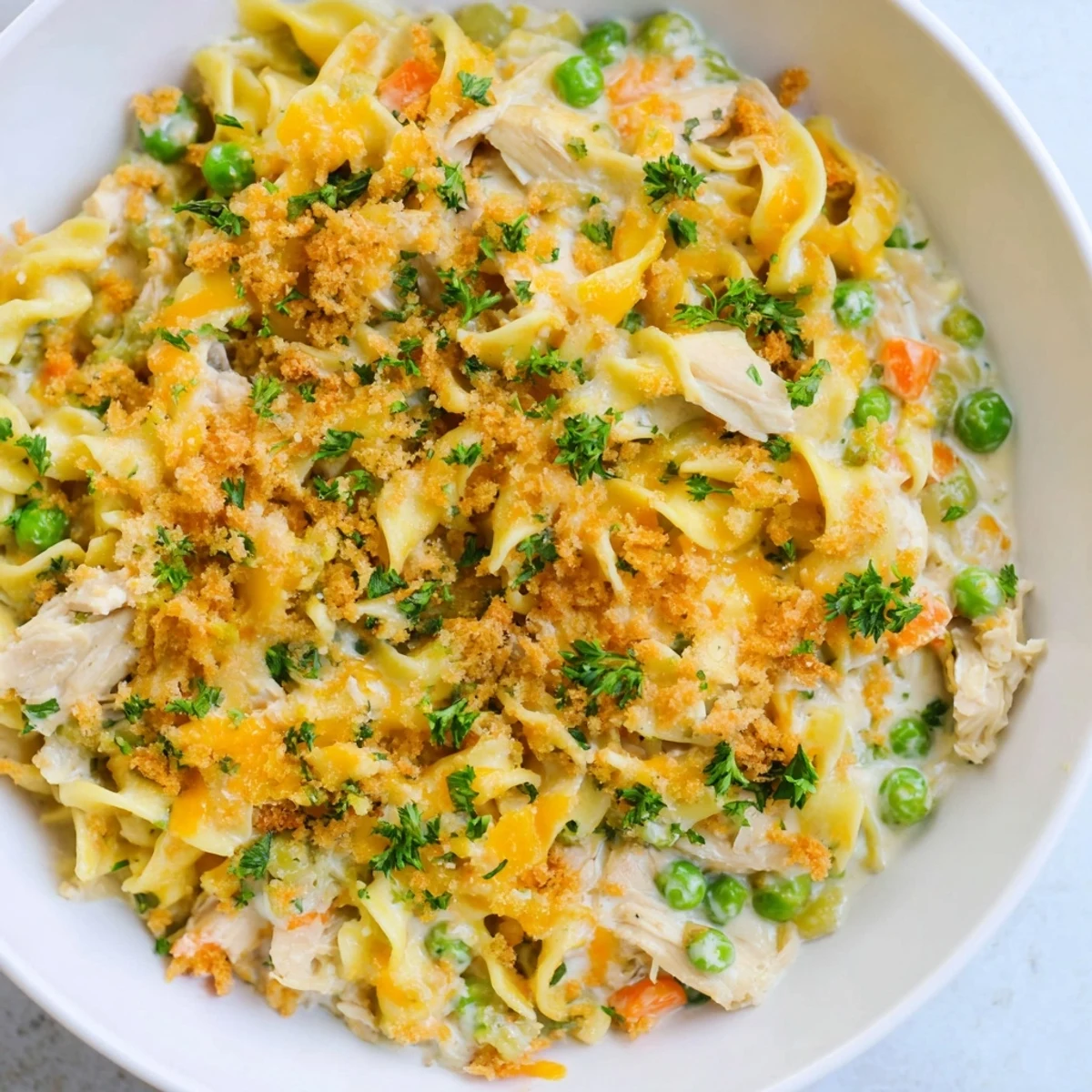 Baked Cream of Chicken Noodle Soup Pasta: a bubbly casserole featuring golden breadcrumbs and melted cheese.