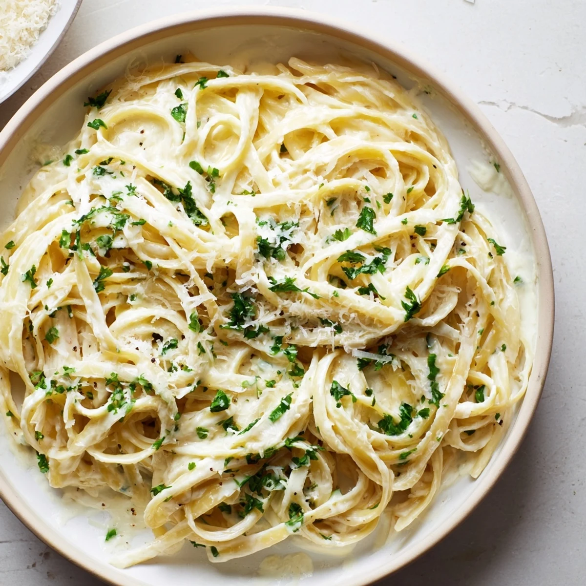 Tender fettuccine pasta coated in creamy, dreamy Creamy Greek Yogurt Spinach Alfredo, perfect for a cozy dinner.