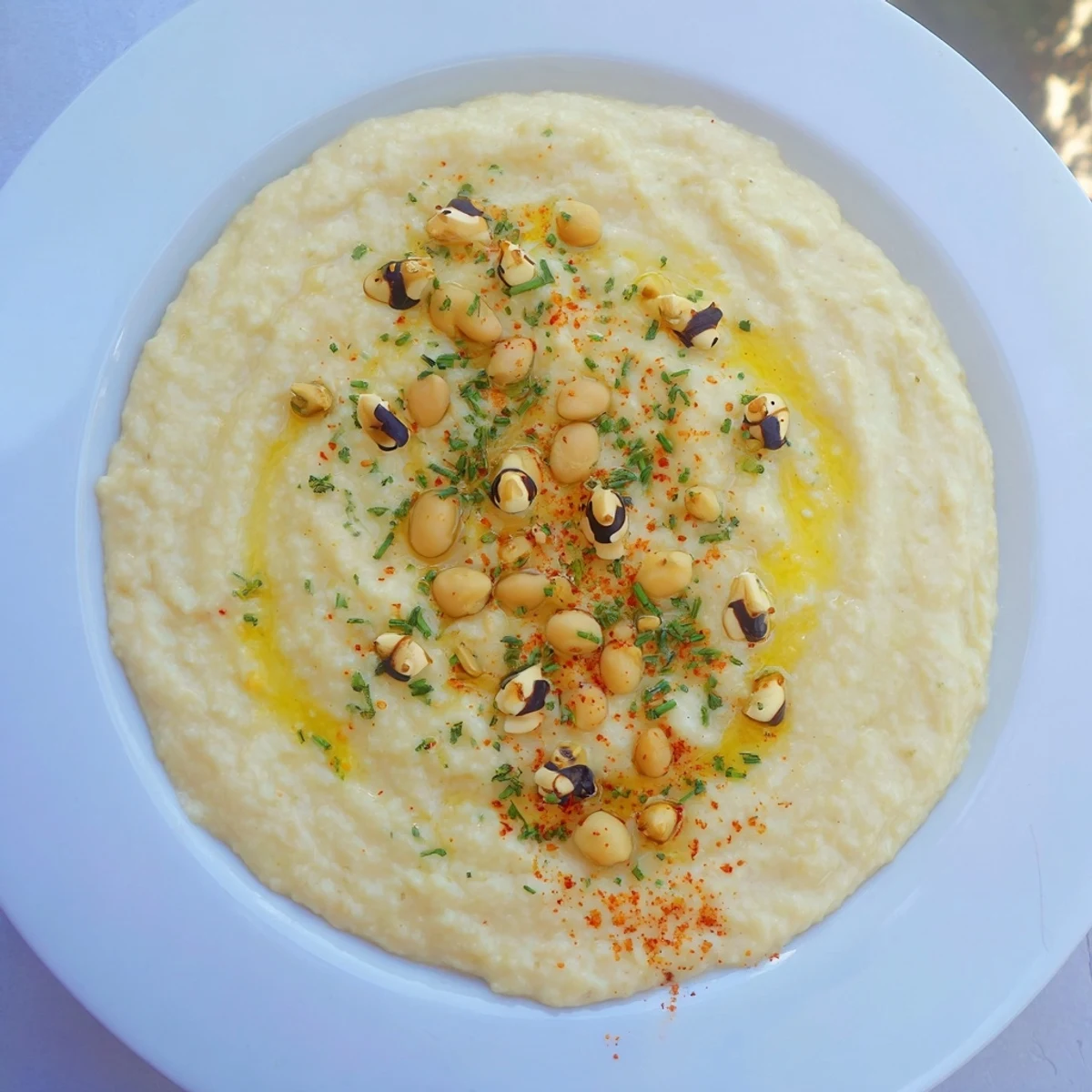 This Winter Dip features a smooth white bean base, ready to be enjoyed with crackers or fresh veggies.