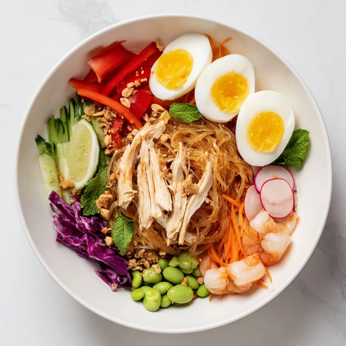 A beautifully arranged Asian Fusion Noodle Bowl Board with vibrant vegetables and savory dipping sauces.