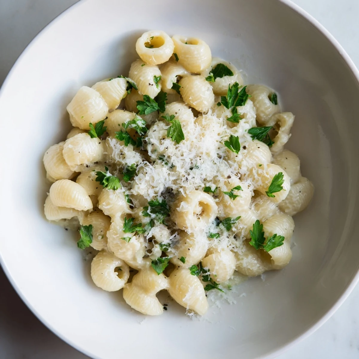 Close-up of vibrant 15-Minute Garlic Parmesan Pasta, showcasing perfectly cooked ditalini and Parmesan cheese.