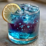 Butterfly pea flower lemonade, a stunning blue-to-purple drink for parties.