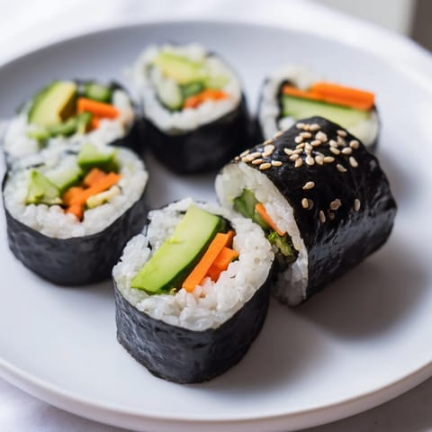 Sliced Avocado Cucumber Sushi reveals layers of creamy avocado and crisp cucumber inside.