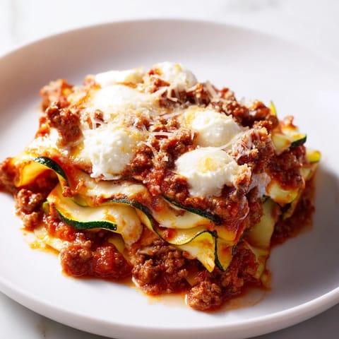 This easy one-pan zucchini lasagna skillet showcases layers of beef, tomato, and creamy ricotta.