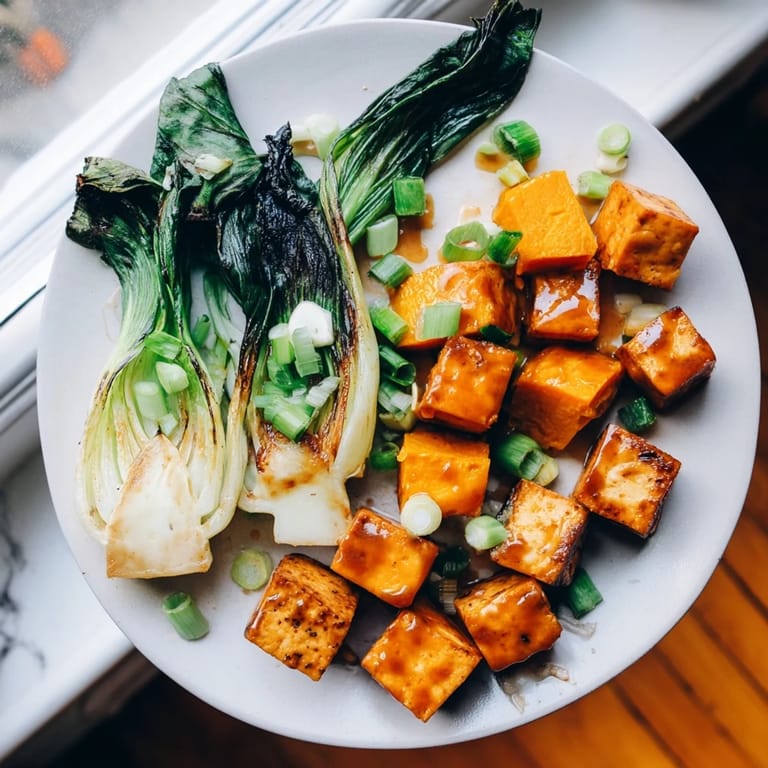 Savory Miso-Glazed Tofu alongside perfectly roasted squash, ready to be enjoyed with fresh bok choy.