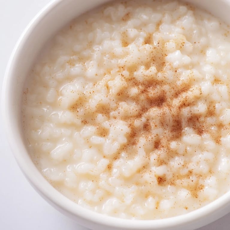 Steaming hot, this Rice Pudding with Leftover Rice presents a comforting, simple dessert, perfect for any night.