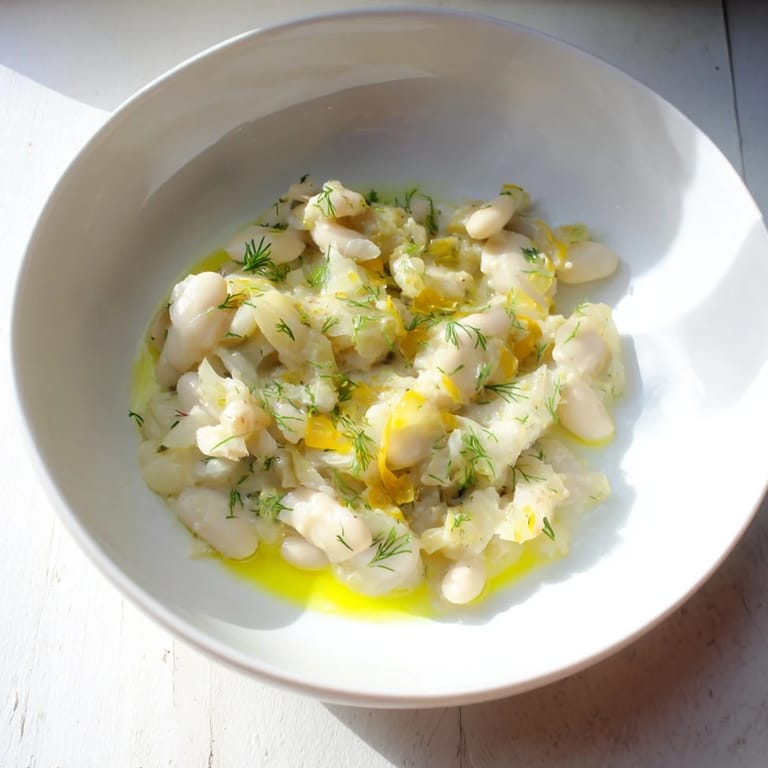 A close-up of hearty Simple White Bean and Fennel Soup, creamy and flavorful, perfect for a cozy dinner.