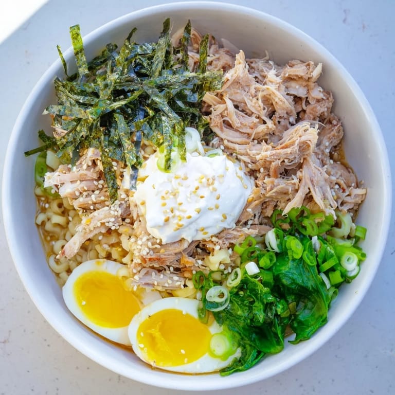 Savory Chicken Ramen with Kewpie mayo and green scallions, perfect for a quick, comforting meal.