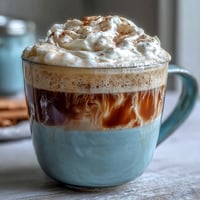 Dandelion Tea Latte with Oat Milk and Vanilla, a creamy vegan latte with earthy roasted dandelion root, frothed oat milk, and warm vanilla aroma.